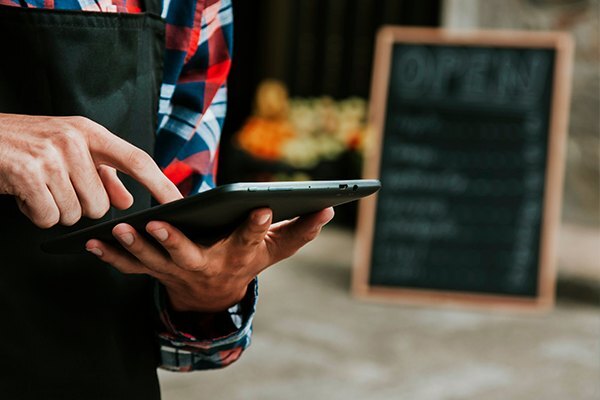 Retail Store Employee with Device