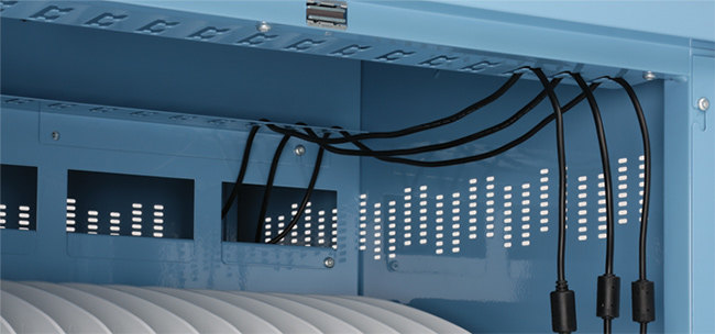 the interior of a Bretford CUBE Cart with a few wires already inserted